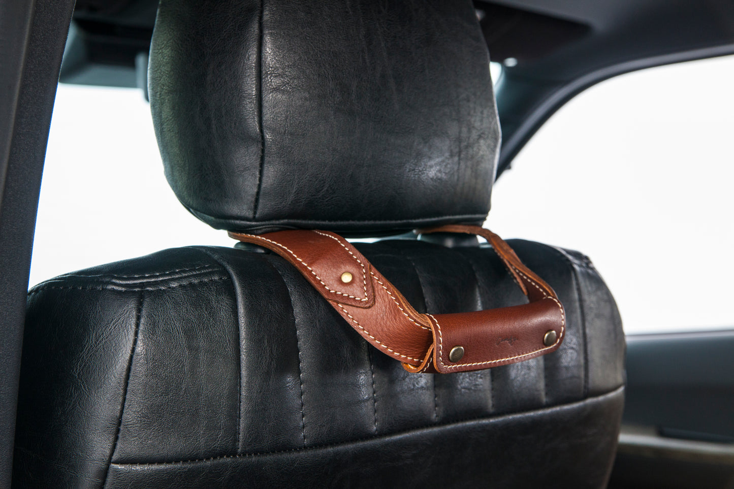 Headrest natural leather grip